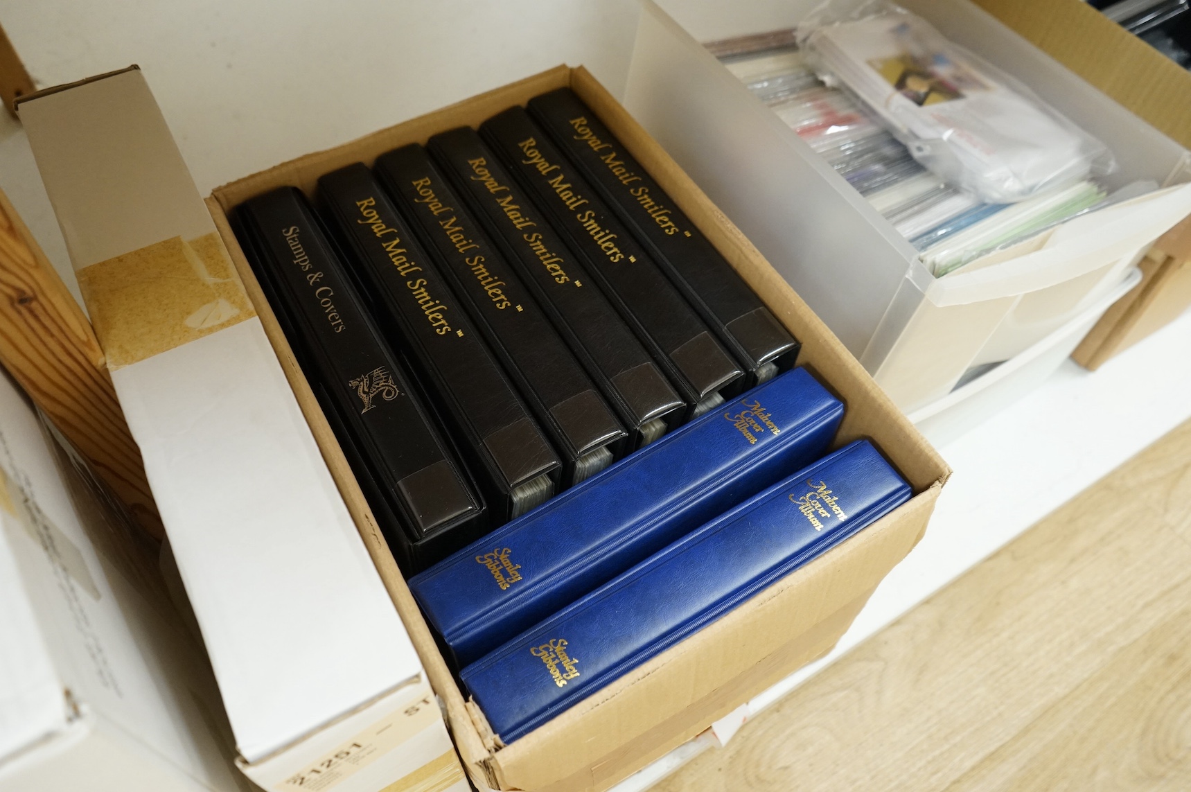 A large collection of Royal Mail Smilers GB FDCs in albums and loose. Condition - varies